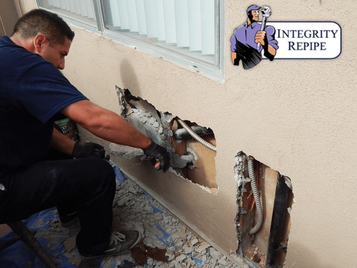 Plumber replacing the plumbing in a house